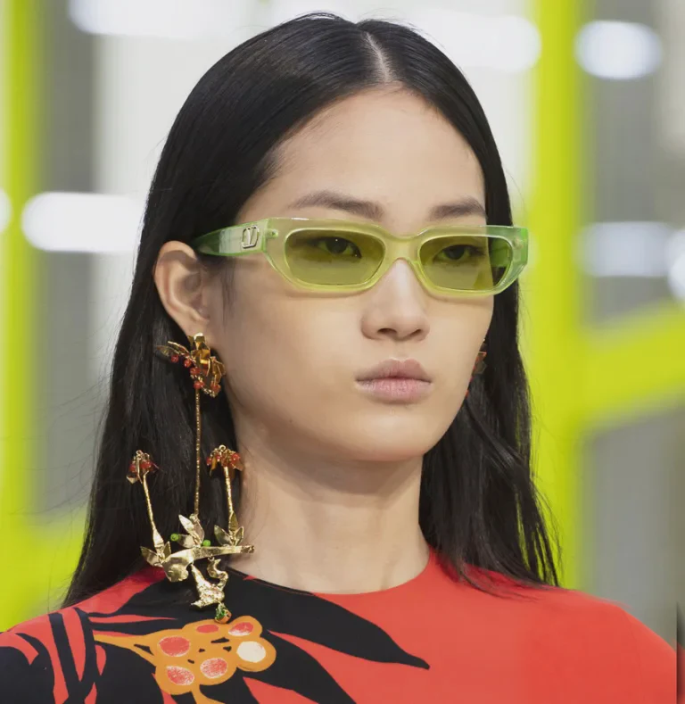 Valentino Spring 2020 runway: model wearing translucent green Valentino sunglasses
